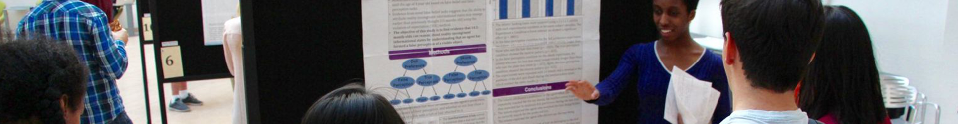 a student presents her poster