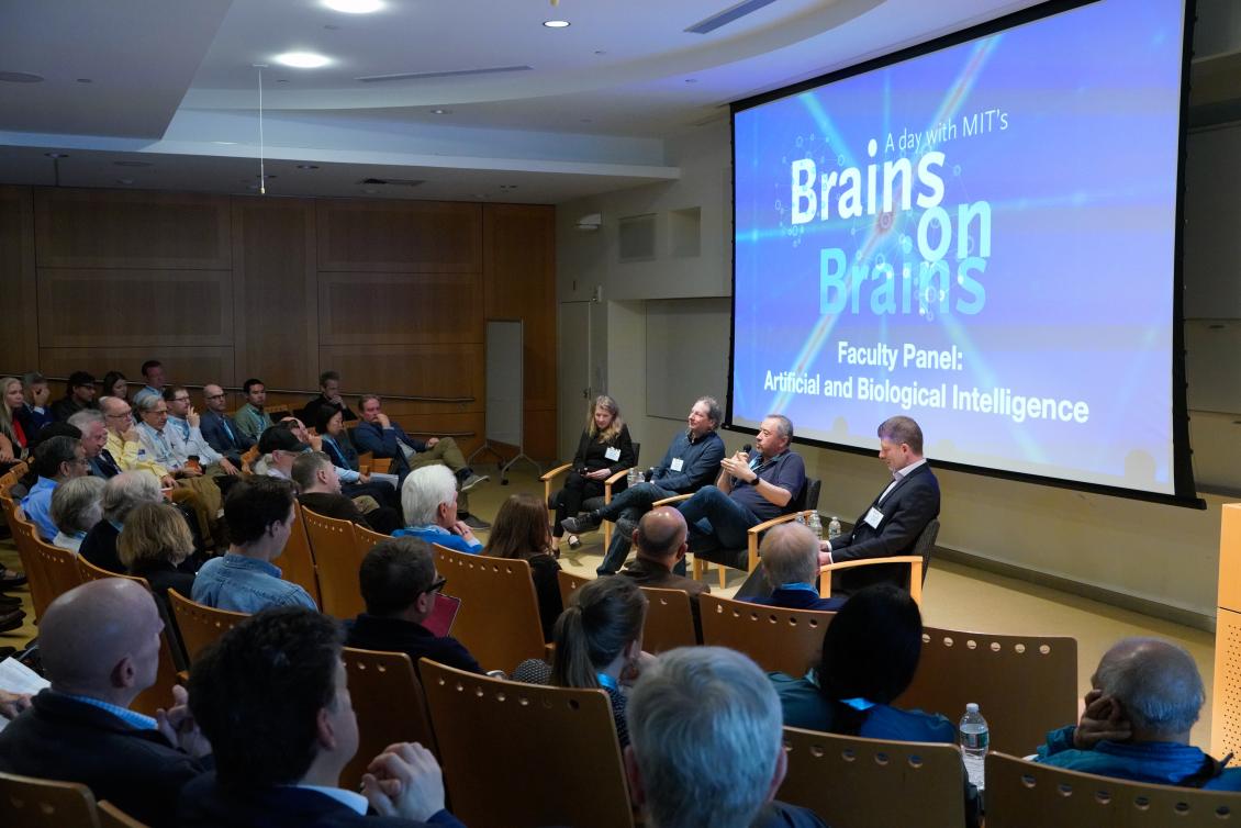 A panel discussion in singleton auditorium